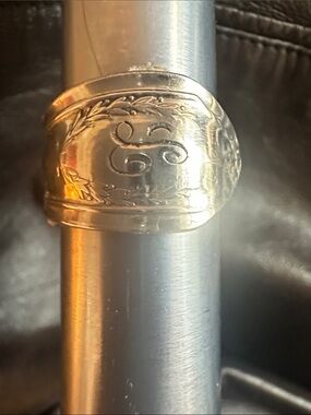 sz 11 sterling silver ring by my parents